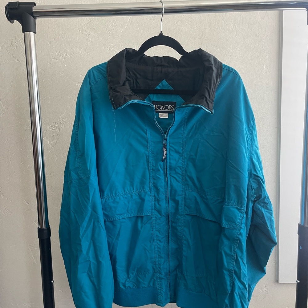 Vintage Blue Windbreaker with Black Collar and Full Zipper